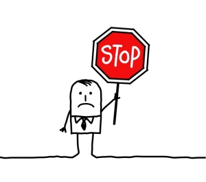 Holding a stop sign